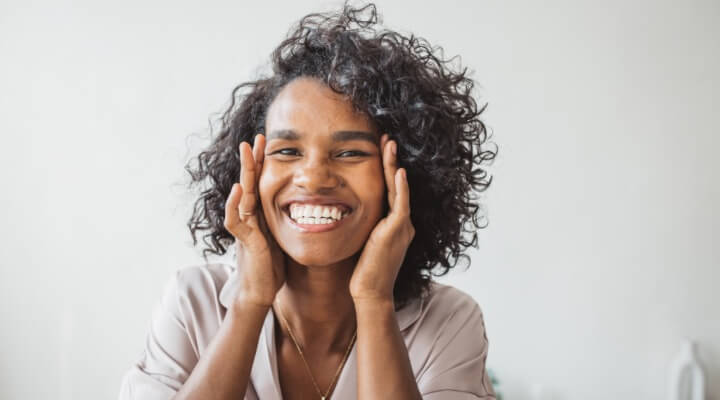 woman touching face